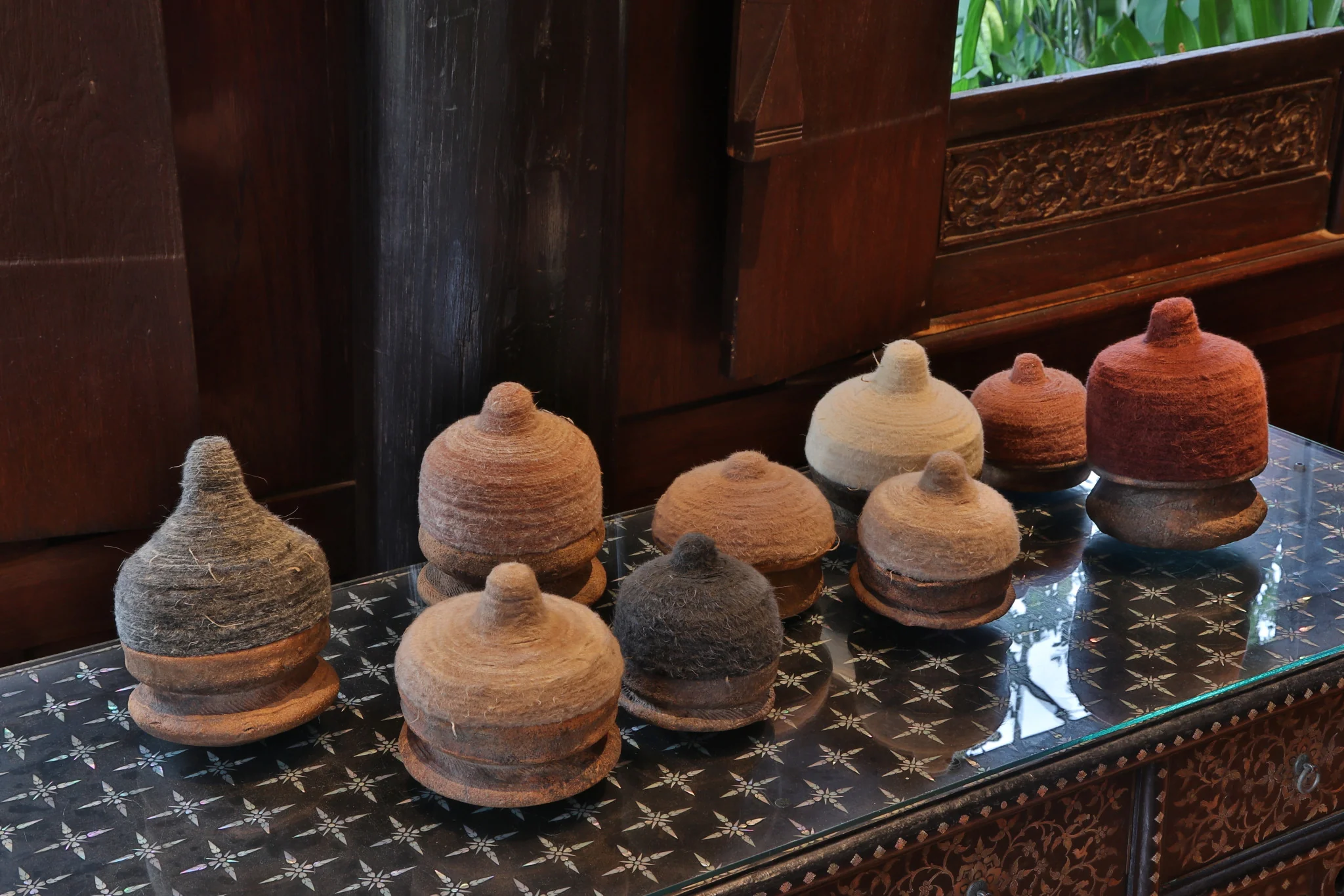 Pinaree Sanpitak, Mor Taan No. 1-9, 2023. Sculpture, . Photo: Aroon Peampoonsopon . Courtesy of the Jim Thompson Art Center and the James H.W. Thompson Foundation © Jim Thompson Art Center