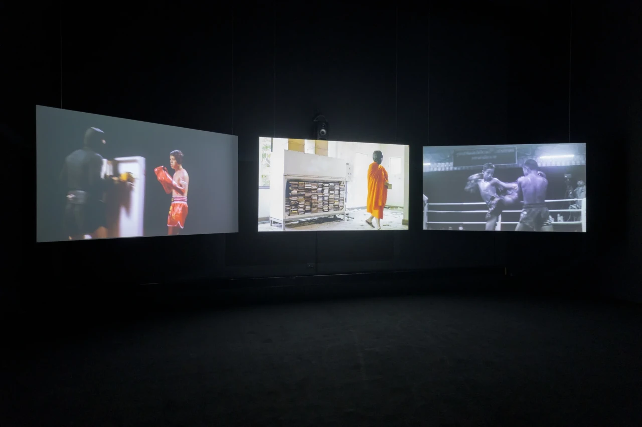 Chulayarnnon Siriphol with Jean Sit Arjan Jo Collective, and Kasamaponn Saengsuratham (Thailand),Red Eagle Sangmorakot: No More Hero in His Story, 2024. Installation view at Bangkok Art and Culture Centre.