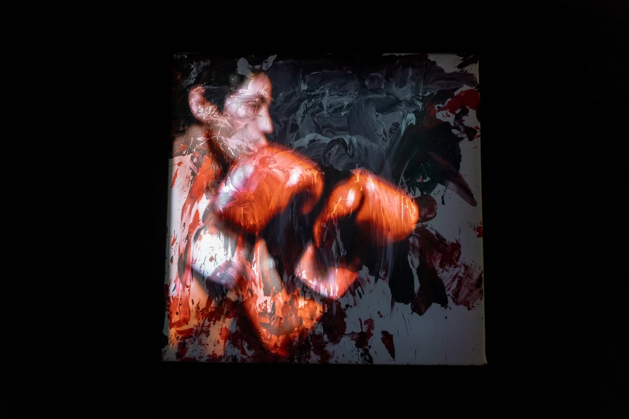 Chulayarnnon Siriphol with Jean Sit Arjan Jo Collective, and Kasamaponn Saengsuratham (Thailand),Red Eagle Sangmorakot: Action painting, 2024. Installation view at Bangkok Art and Culture Centre.